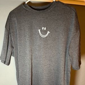 Over sized grey t-shirt with white smily face!